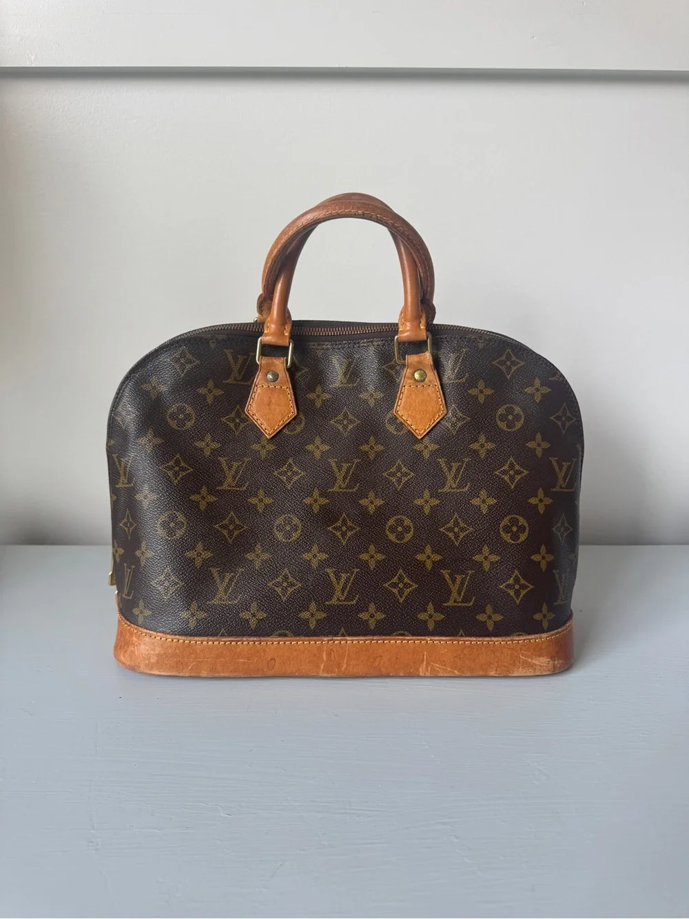 Authentic Louis Vuitton Classic Monogram Alma , Leather Top-Handle Bag in Brown
